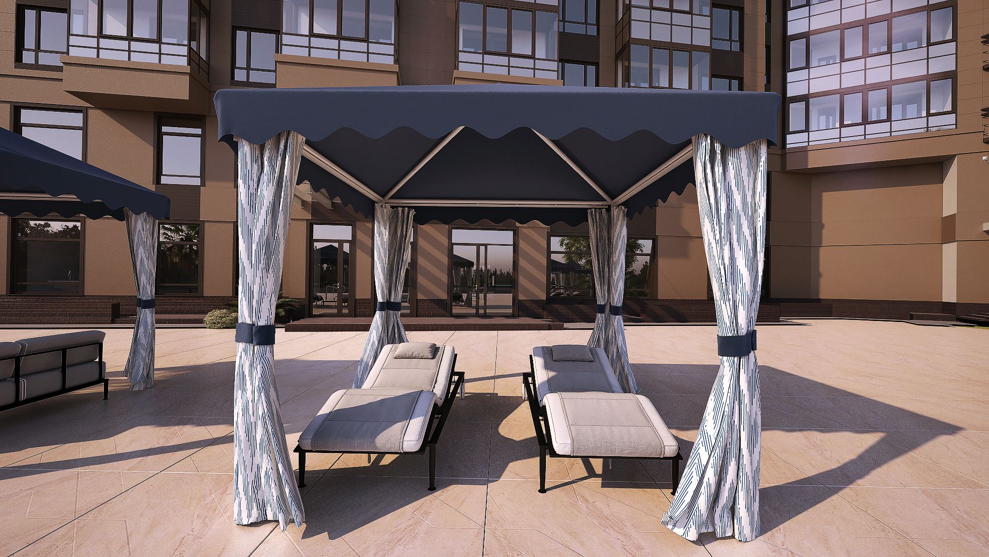 Academy Design's Executive cabana, photo taken from the front, showcasing its corrosion-resistant 6061-T6 aluminum frame with a marine-grade fabric peaked roof featuring a loose valance. The mock curtains, made of marine-grade upholstery fabric, wrap around the structure's posts to conceal hardware, epitomizing luxury for upscale hospitality settings.